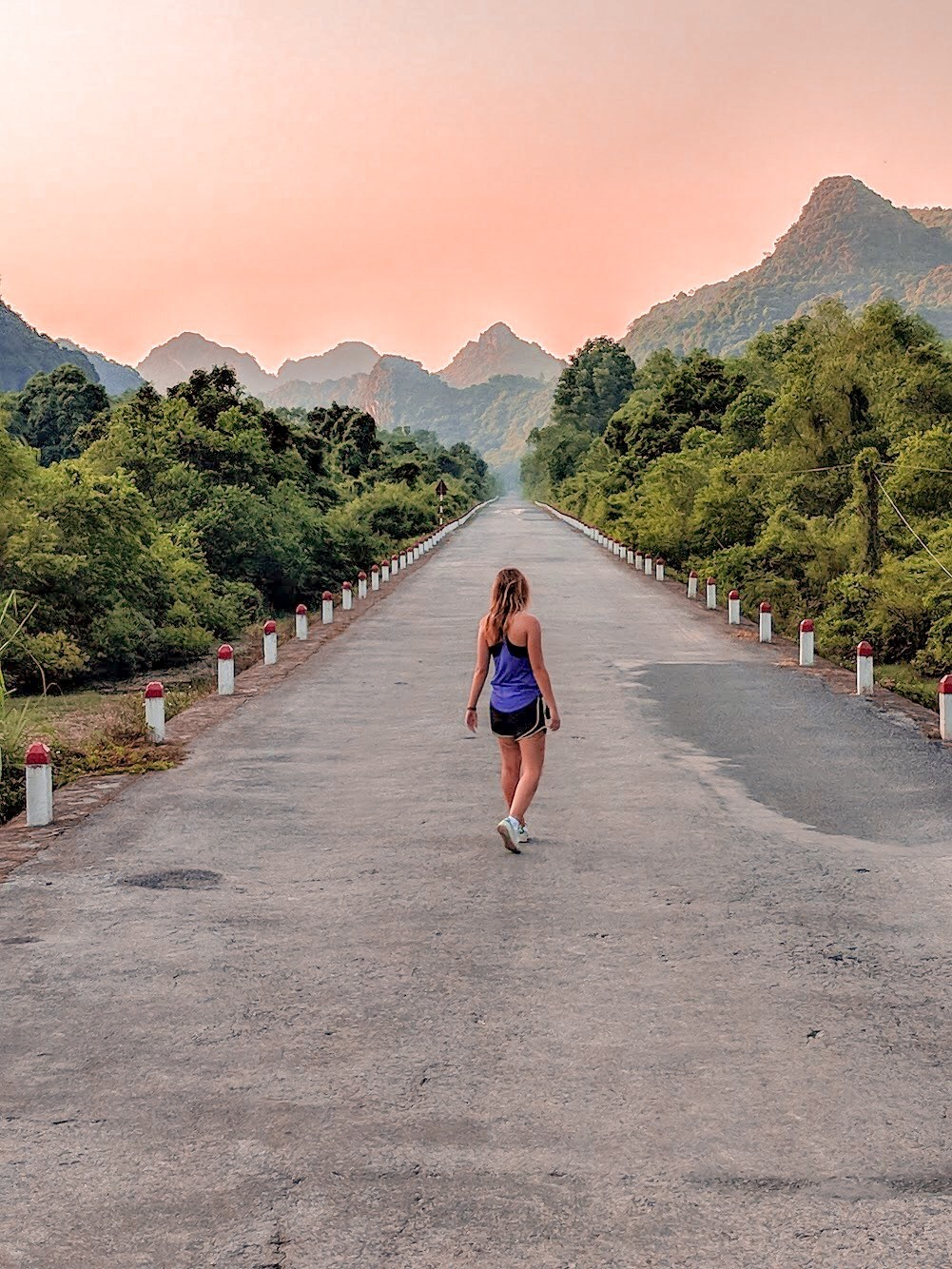 Cruising through the stunning limestone karsts of Ha Long Bay from Cat Ba Island