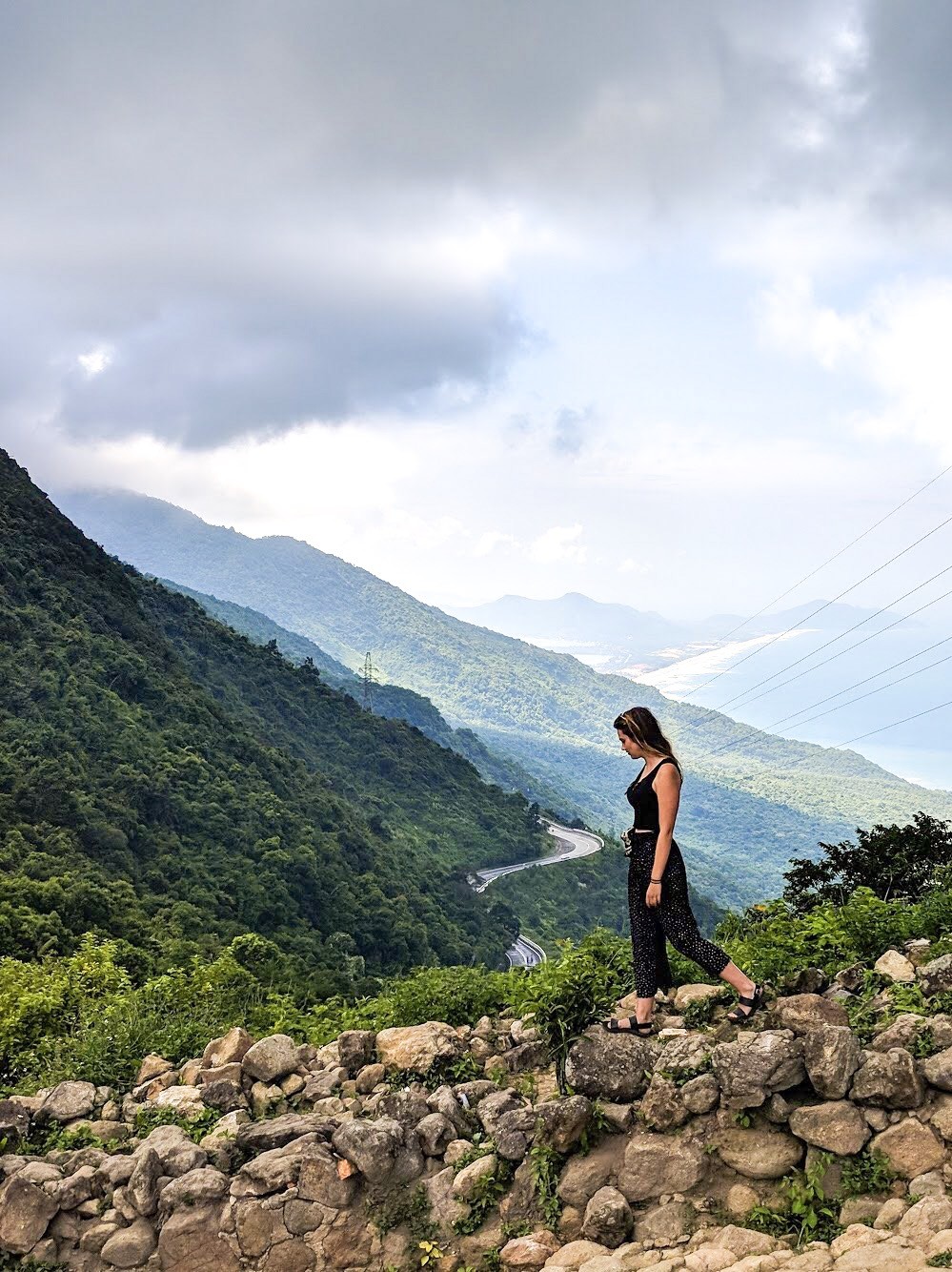 Motorbiking through the breathtaking Hai Van Pass, experiencing Vietnam's stunning coastal scenery