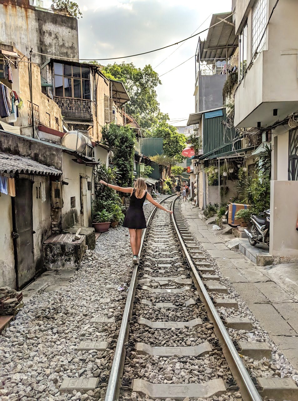 Exploring the Old Quarter of Hanoi, with its vibrant street life and historical architecture