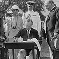 President Coolidge signing the Johnson-Reed Act