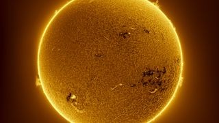 sun appears as a glowing yellow ball of plasma.