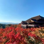 Kiyomizu-dera Temple in Kyoto during autumn, showcasing vibrant foliage