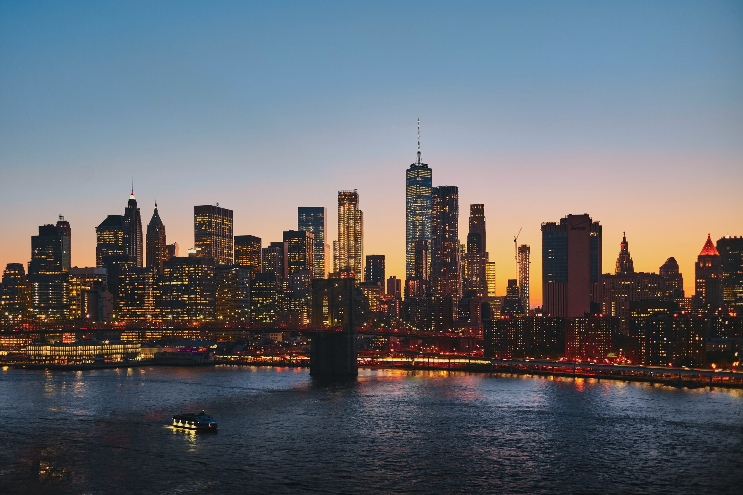 New York City skyline at sunset, vibrant and iconic, representing culture, excitement, and urban romance for an anniversary