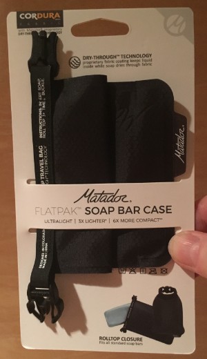 Holding my Matador FlatPak soap case still in the package.