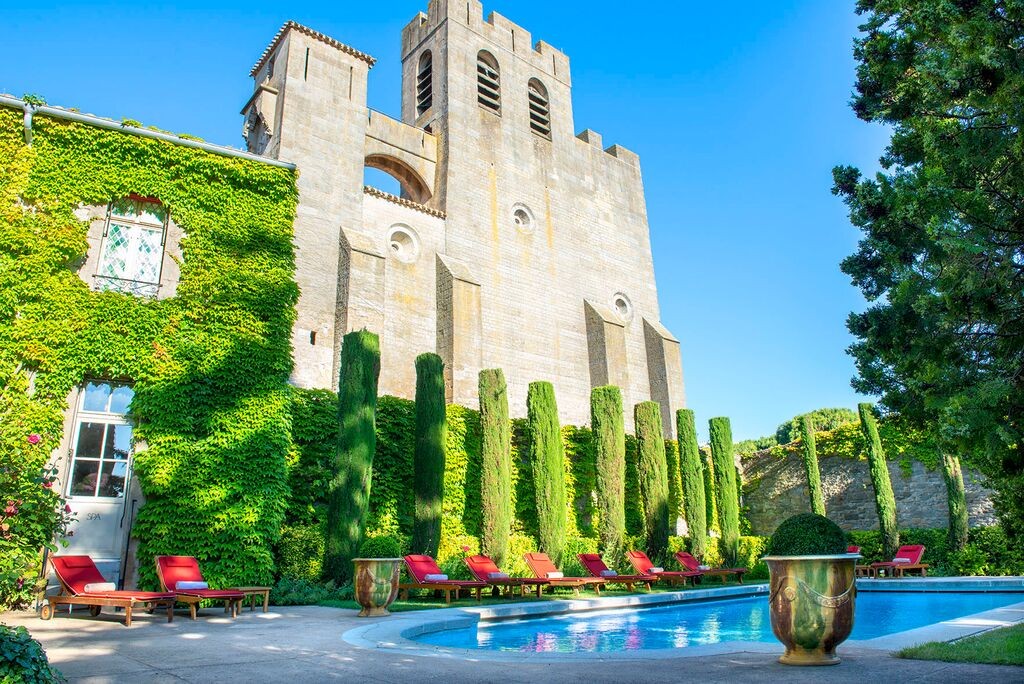 Luxurious hotel nestled within the medieval walls of Carcassonne, France, offering a fairy-tale setting for an anniversary celebration