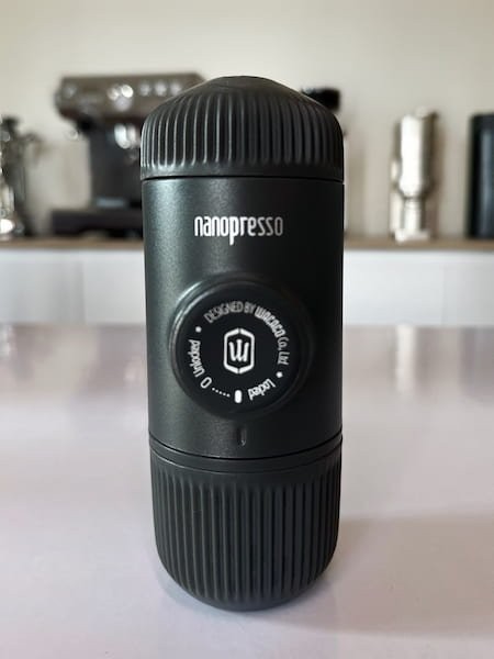 Wacaco Nanopresso portable espresso maker with a blurred background