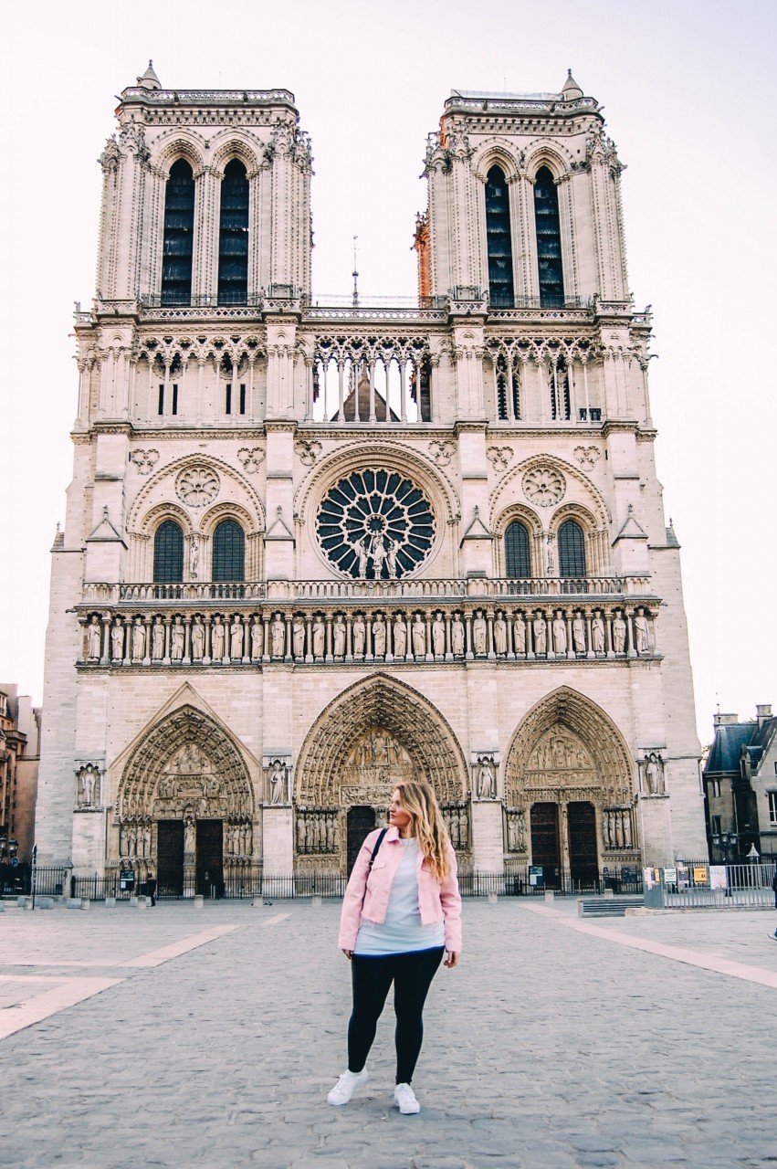 Notre Dame Cathedral in the morning light, showcasing its iconic twin towers.