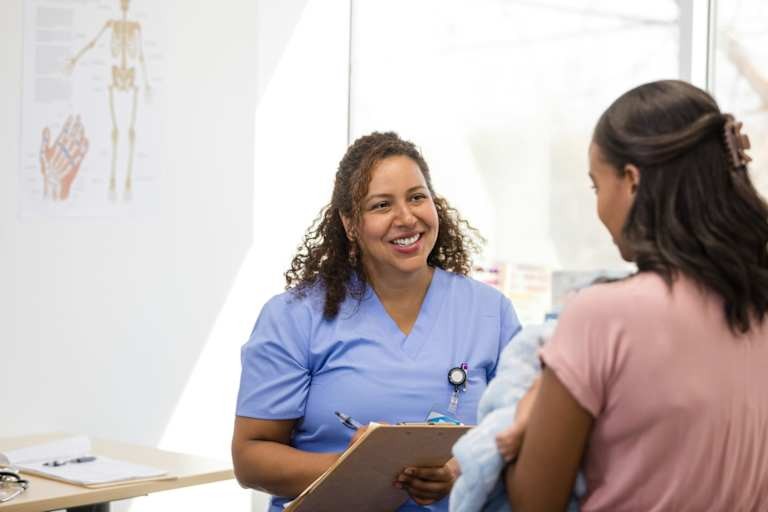 Experienced nurse providing care and support to a patient and their family.