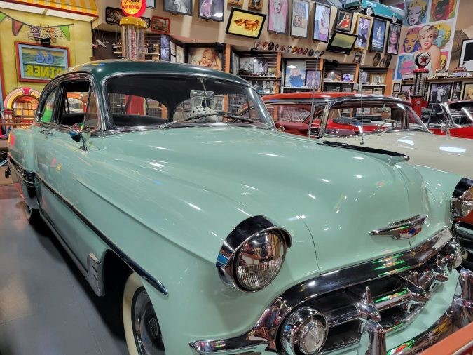 A vintage Chevrolet car, possibly from the 1950s, showcased in the museum