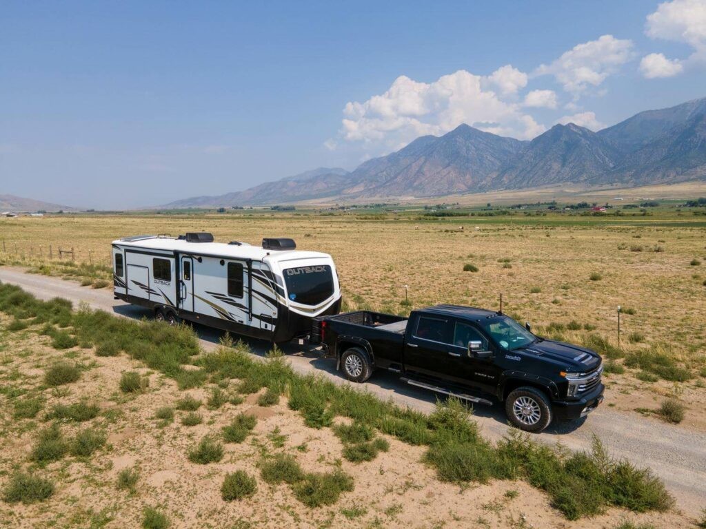 Truck towing Keystone Outback camper