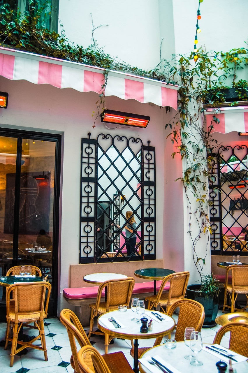 Grand Amour Hotel's stylish brunch setting, showcasing Parisian cafe culture.