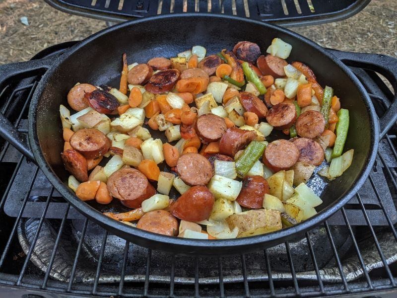 Our previous grill with our cast-iron skillet.