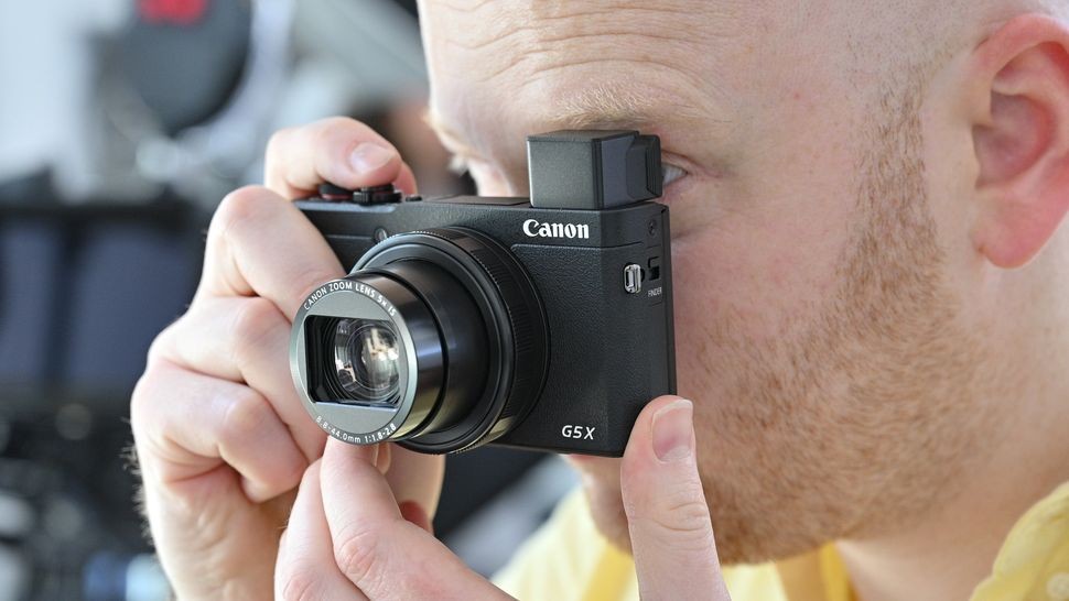 Canon PowerShot G5 X Mark II camera in a testing environment, highlighting the detailed testing process for compact travel cameras