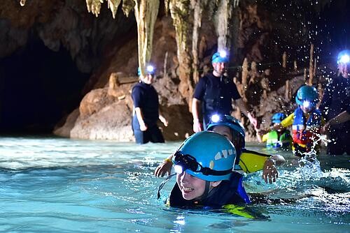 Exploring underground river with a travel ring