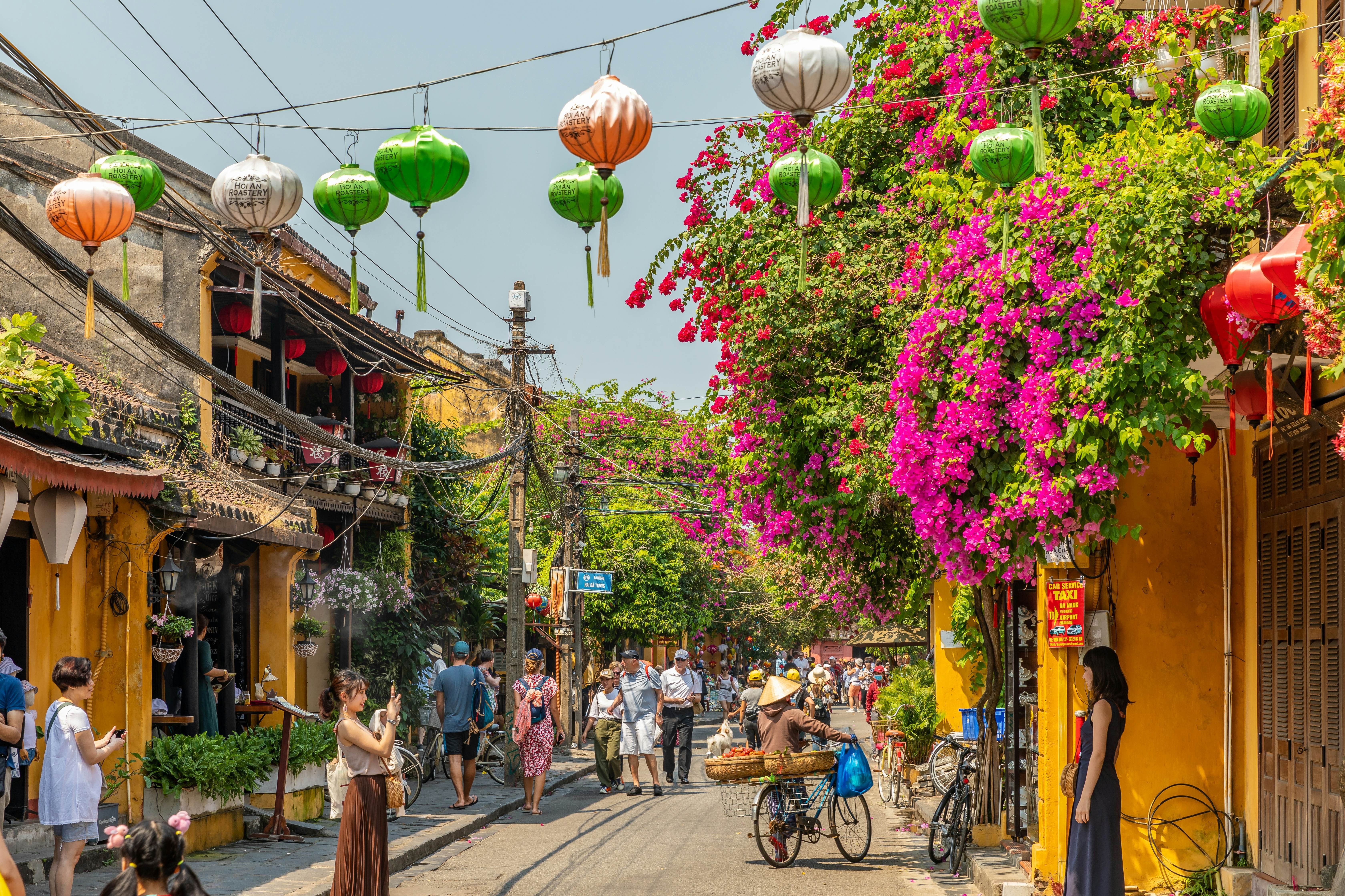 Lanterns illuminate the streets of Hoi An, Vietnam, creating a magical atmosphere in this charming UNESCO World Heritage town