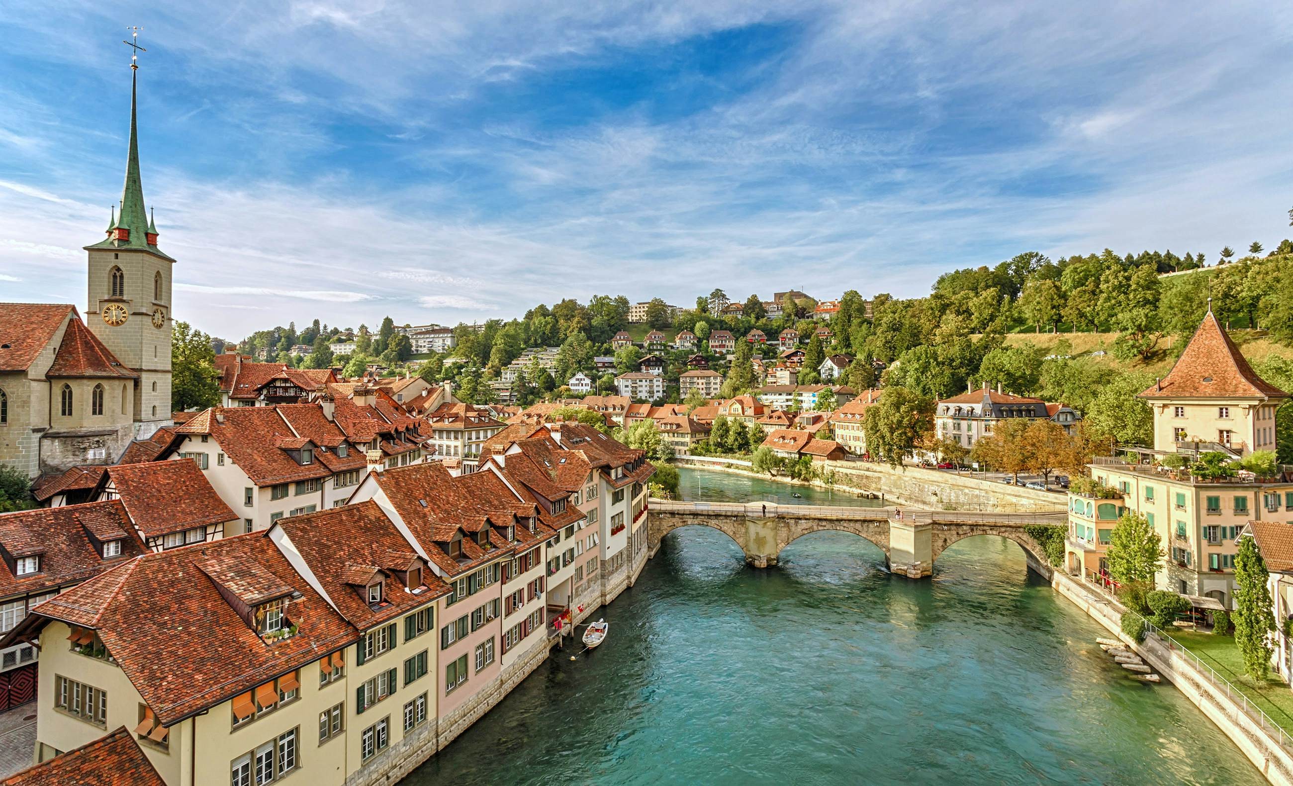 A view of old town buildings by the river in Bern, Switzerland.