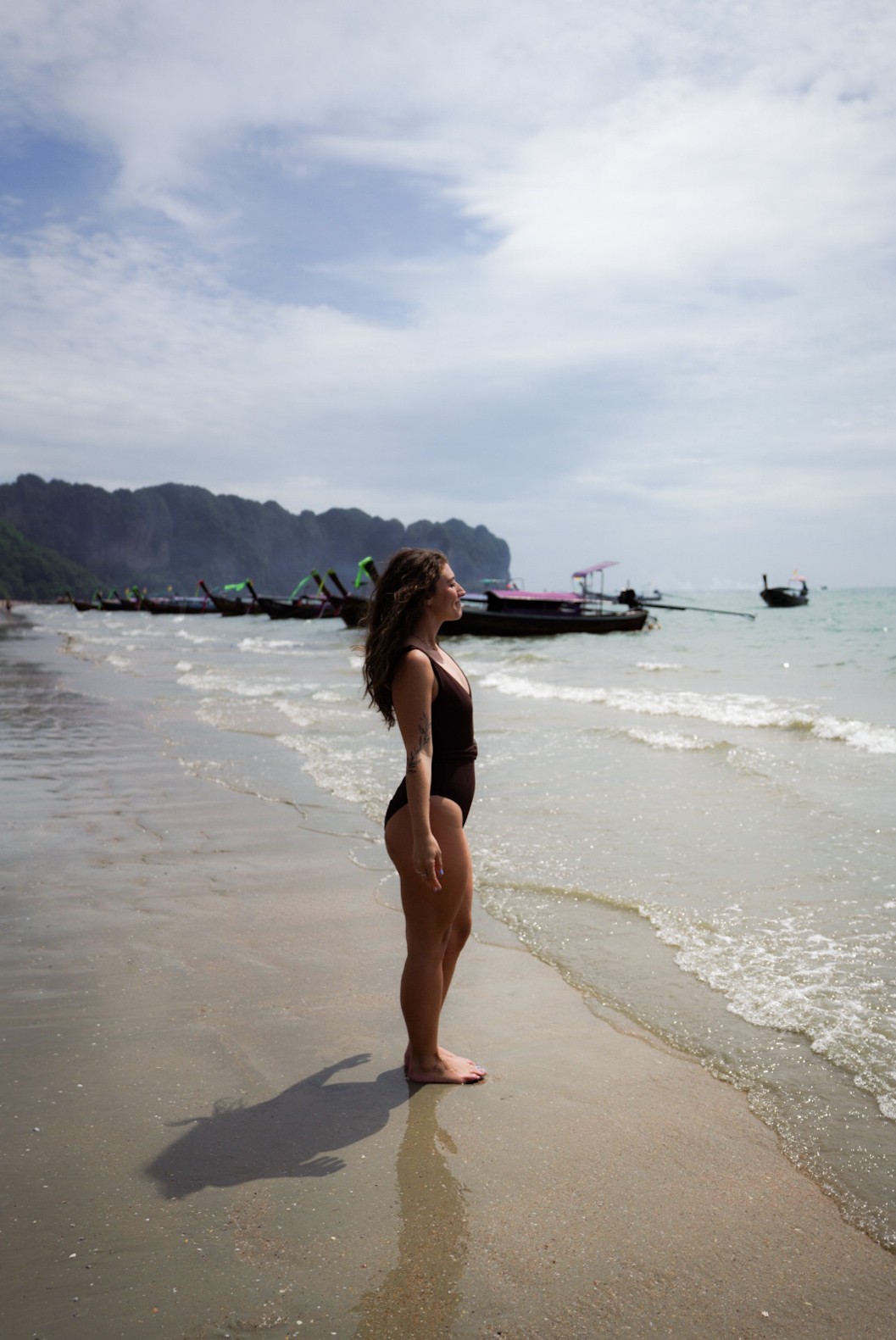 Tourists relaxing on Ao Nang Beach, Krabi, Thailand