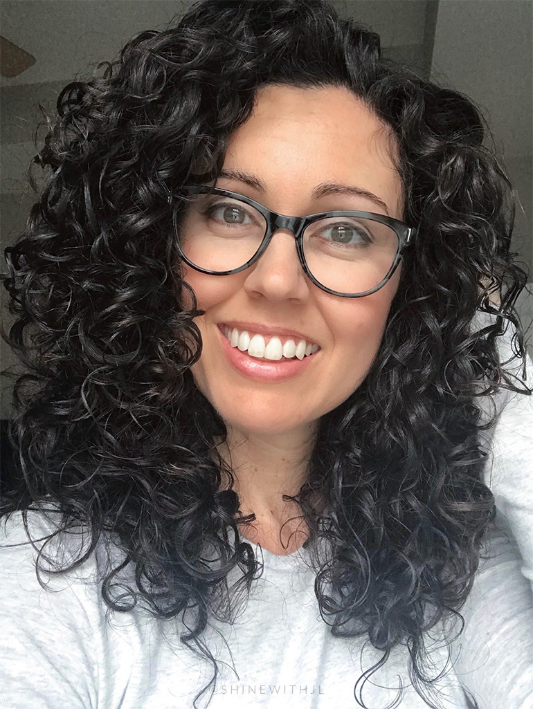 2c 3a Naturally Curly Hairstyle with Travel Dryer and Green Glasses