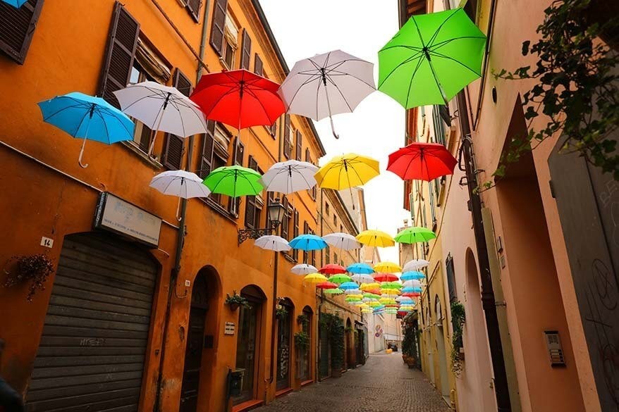 Colorful umbrella street in Ravenna, Italy, adding charm to the city