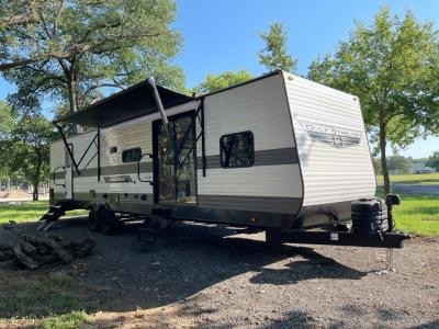 Interior view of a destination trailer living area showing residential style comfort and spaciousness.