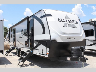 Interior of a New 2025 Alliance RV Delta 281BH Travel Trailer, featuring a bunkhouse and U-shaped dinette, ideal for family camping trips.