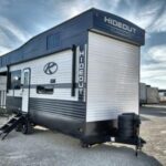 Exterior view of a Keystone RV Hideout 2 story travel trailer showcasing its spacious design.