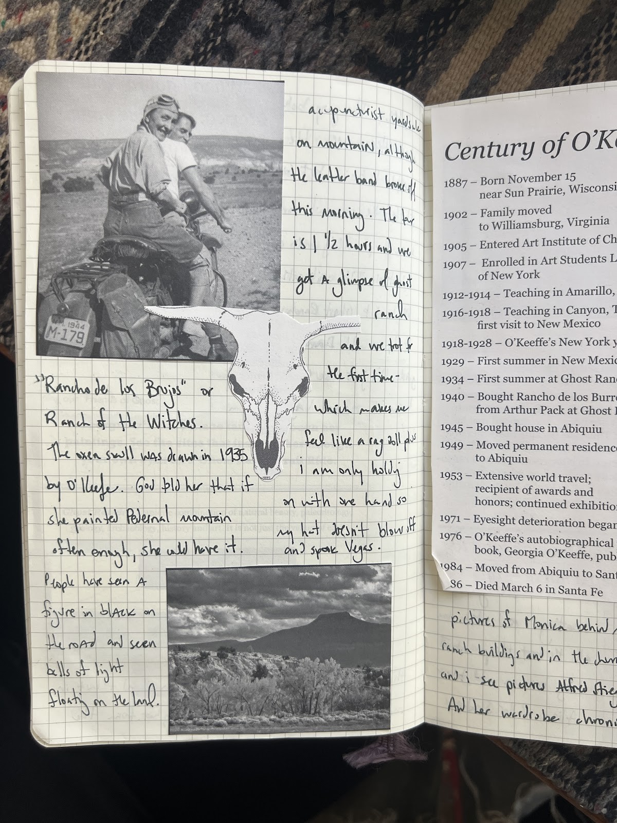 Hands arranging paper memorabilia on a travel journal, emphasizing the tactile and creative process