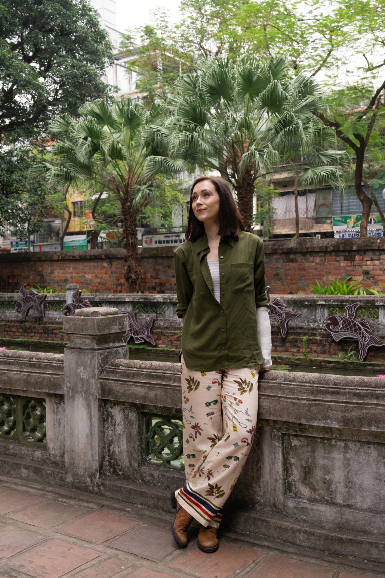 Travel blogger Jordan Gassner at the Temple of Literature in Hanoi, Vietnam, exploring historical sites in the city - Vietnam travel blog 2024