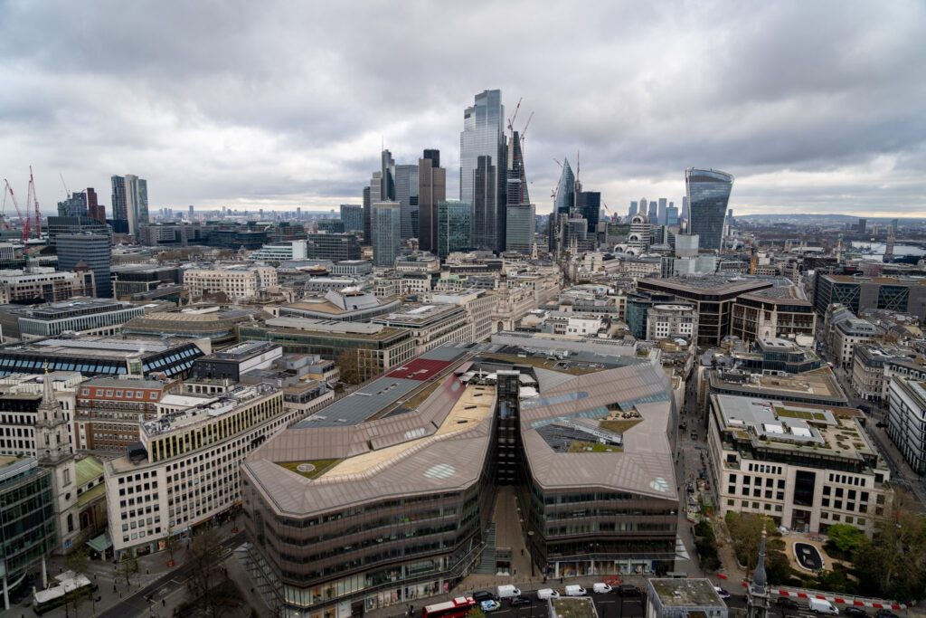 Another perspective from St. Paul's Cathedral, showcasing the intricate details of the dome and the cityscape beyond