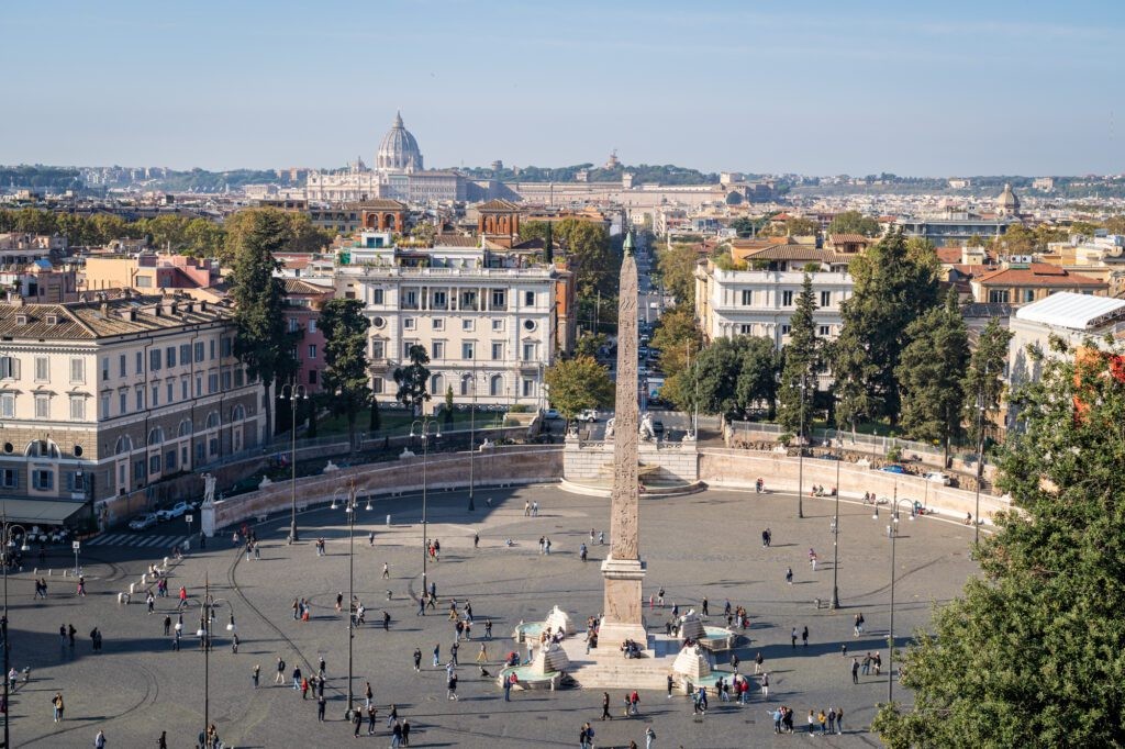 People enjoying panoramic views from Giardino degli Aranci in Rome