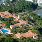 Aerial view of Hotel das Cataratas, A Belmond Hotel, Iguassu Falls showcasing its location near the waterfalls