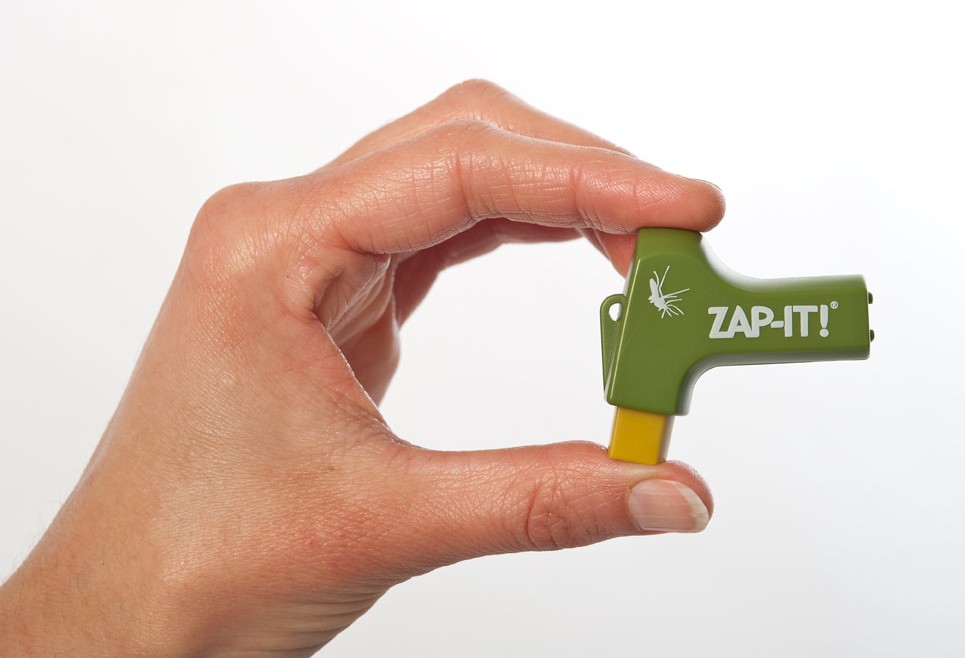 A hand holding Zap It mosquito bite relief device - Zap It mosquito bite zapper review showcasing ease of use