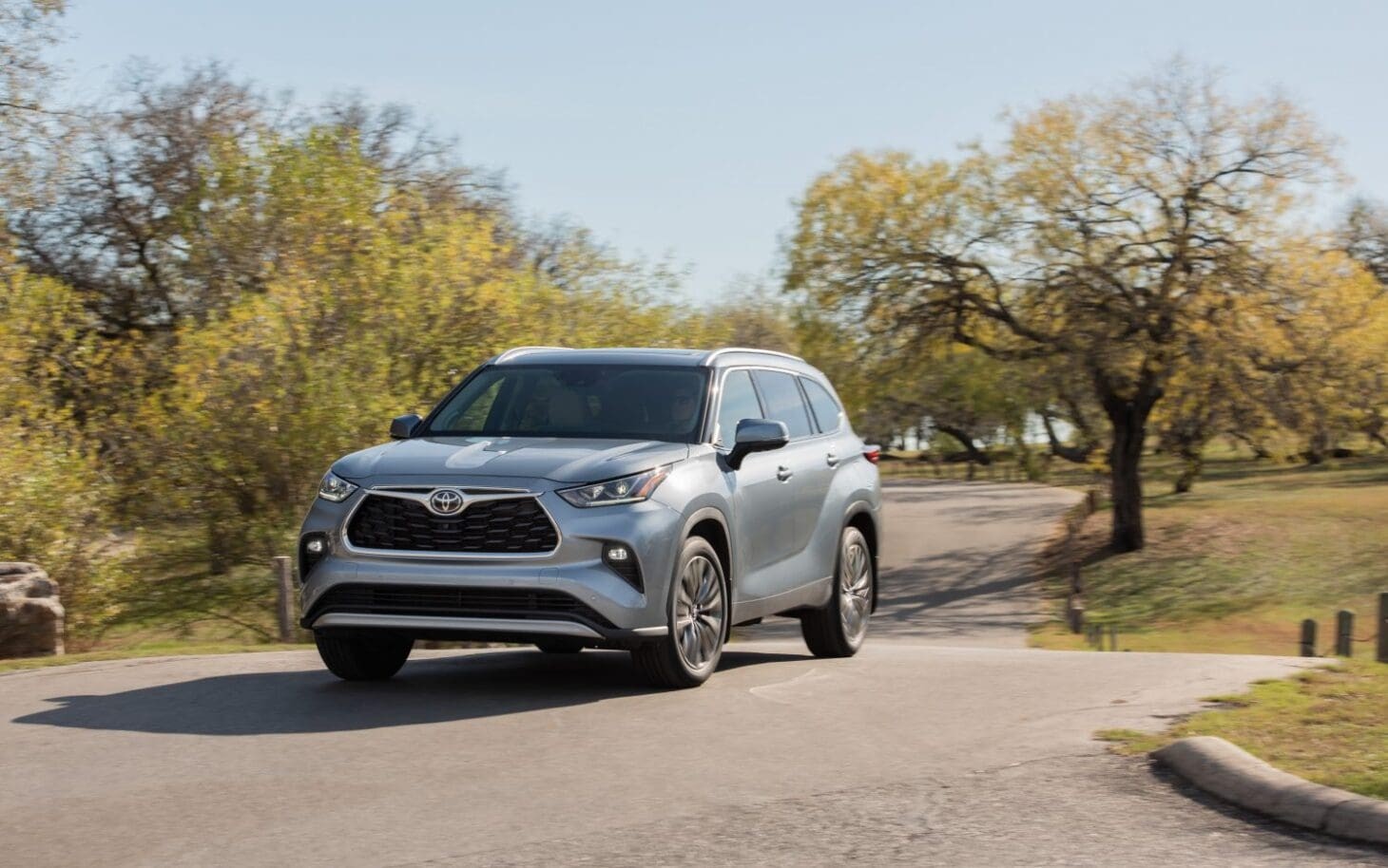Toyota Highlander Hybrid parked on a scenic overlook