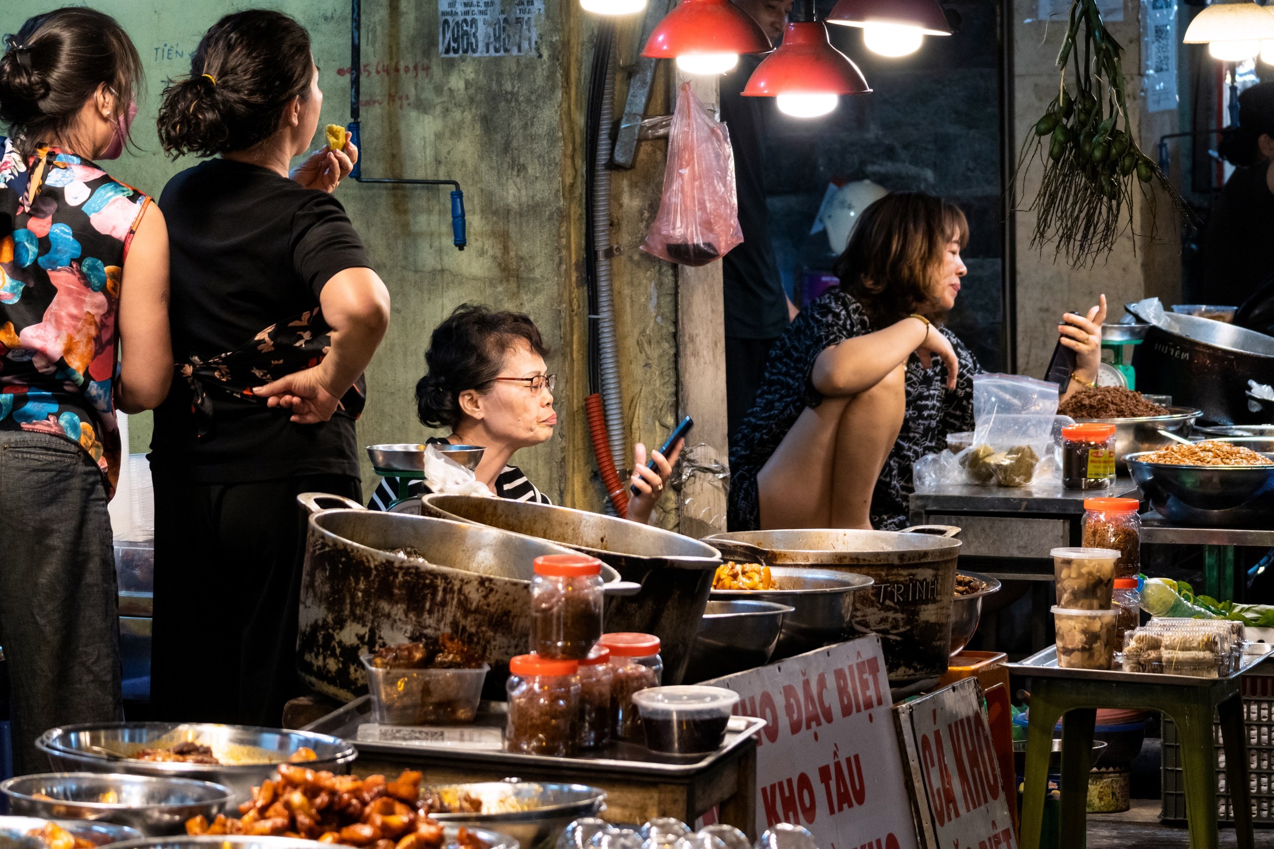 Street food vendors in the night markets of Hanoi