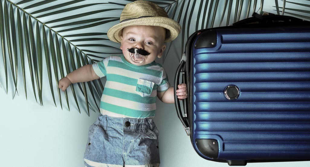 Baby with suitcase