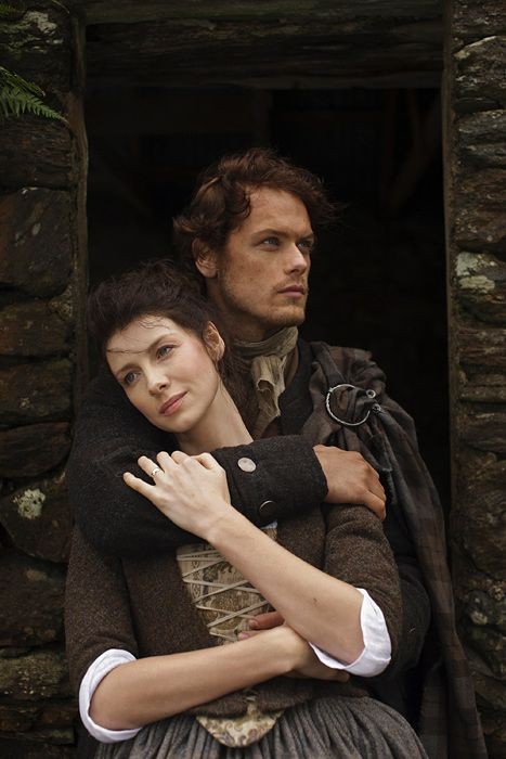 Claire and Jamie reunited after years, illustrating the equal passage of time for both