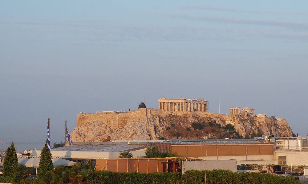 Couple exploring ancient ruins in Greece, showcasing the cultural immersion experiences offered by Audley Travel