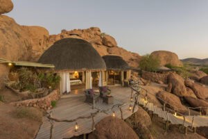 A luxurious suite at Camp Kipwe in Namibia with scenic desert views