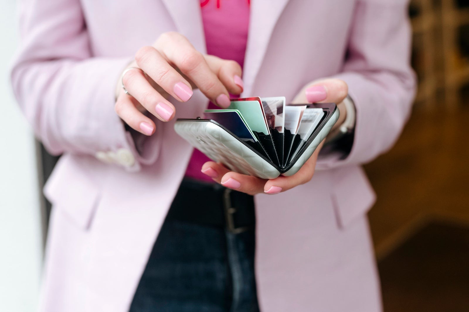 Traveler using a rewards credit card for hotel booking