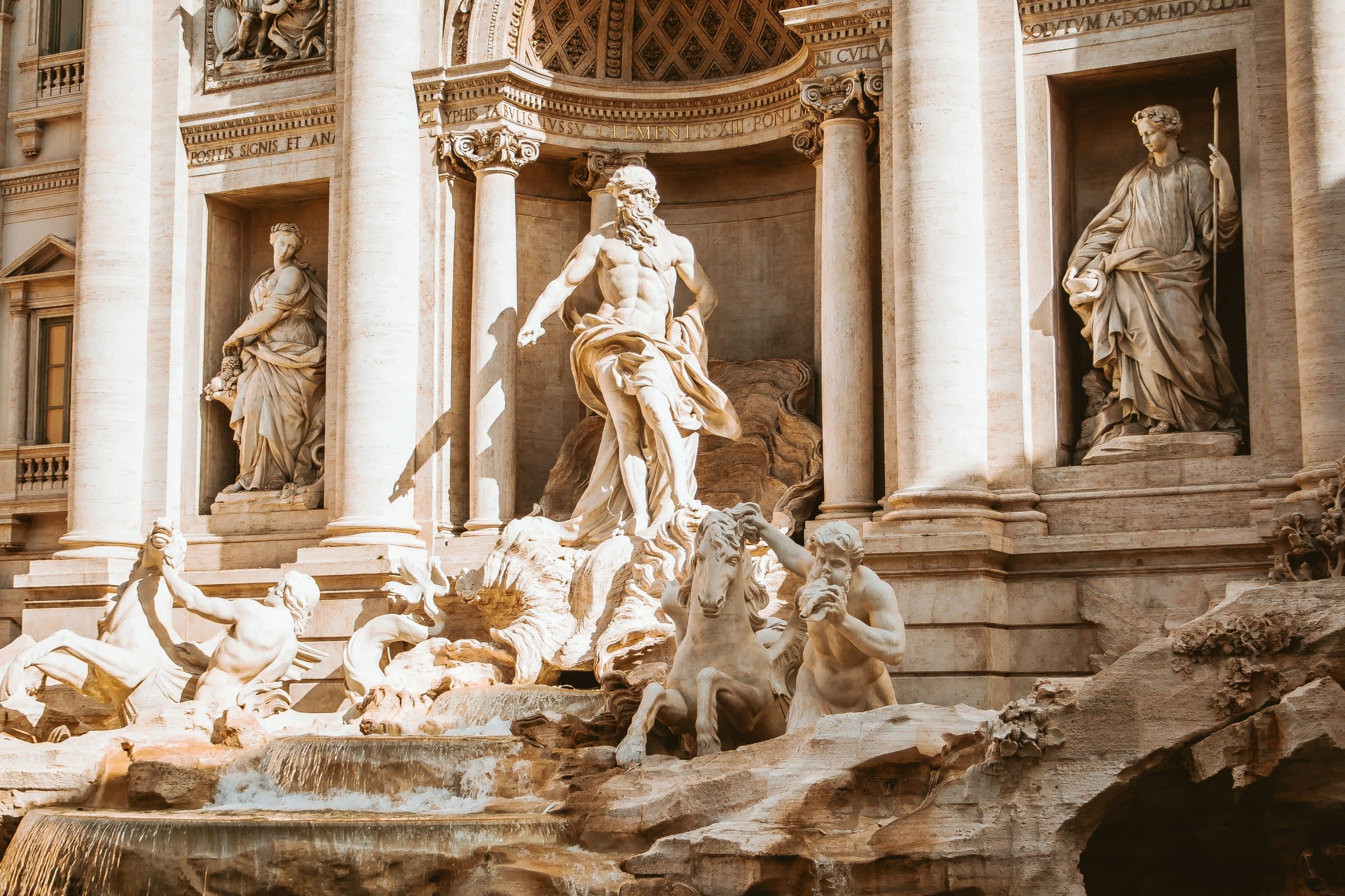 Classical marble statues depicting several historical figures , depicting artistry and heritage