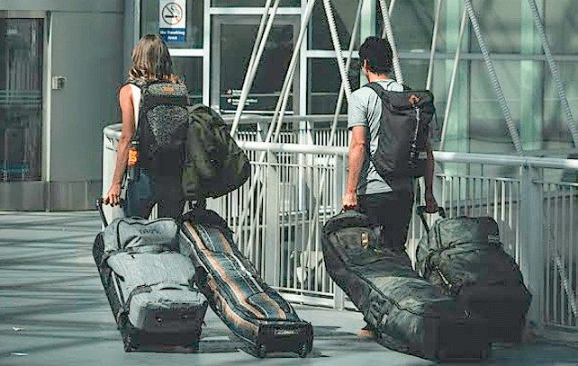 Snowboard gear packed in a Dakine bag