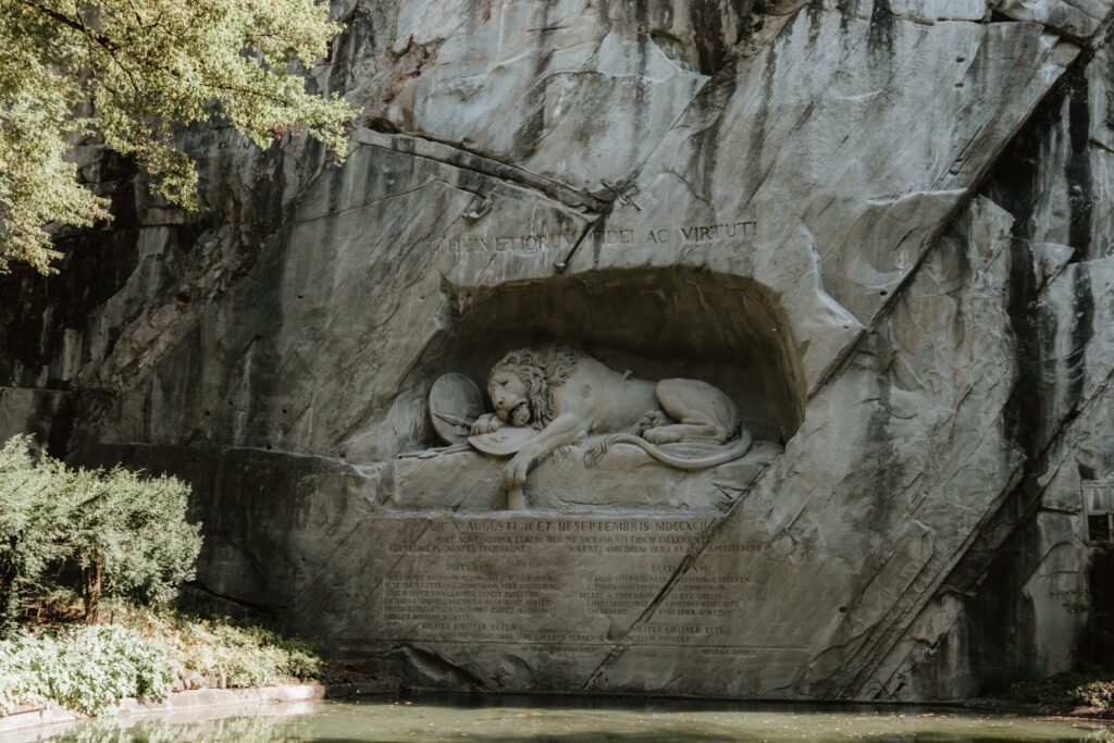 The Lion Monument in Lucerne, capturing the somber and reflective nature of the memorial.