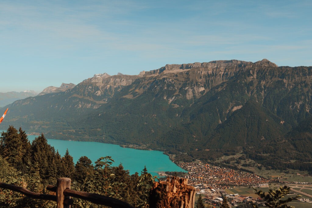 A panoramic view from Harder Kulm overlooking Interlaken, showcasing the stunning lakes and mountains.