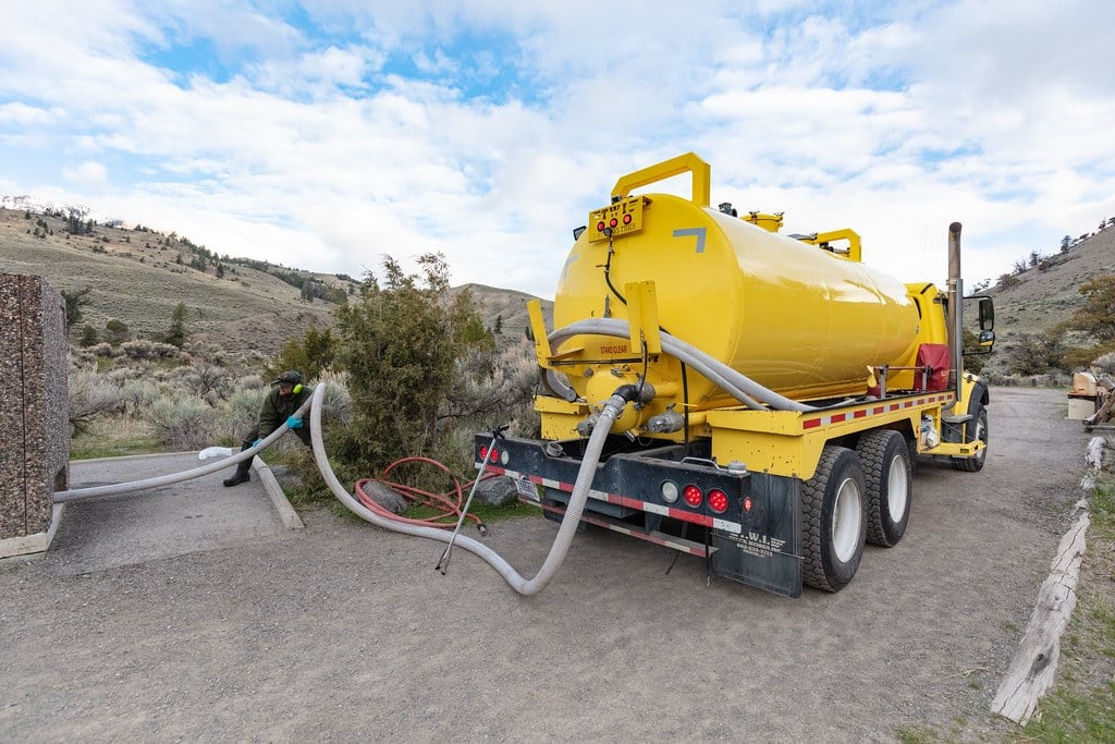 Honey wagon providing black water removal service showing modern wastewater management