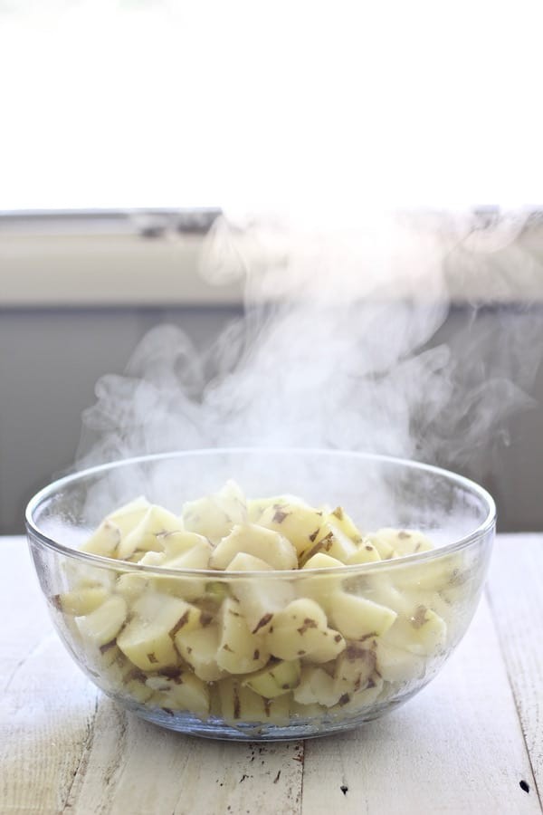 Cooked potatoes steaming.