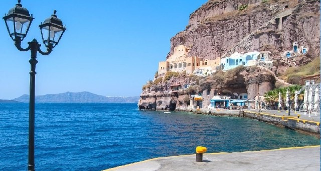 The old scenic port of Oia surrounded by cliffs in Santorini