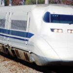 Shinkansen Bullet Train speeding through the countryside
