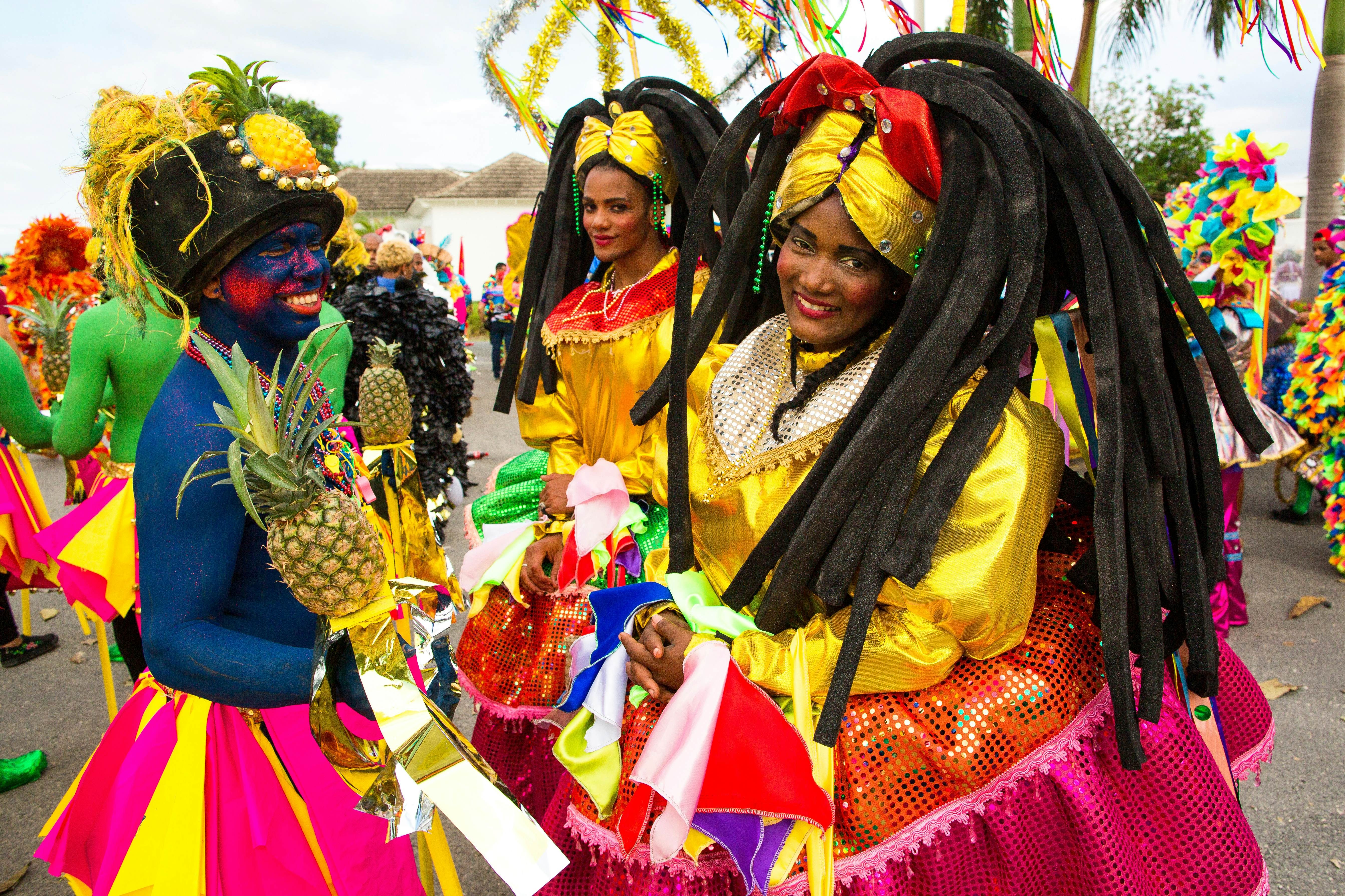 Participants in colorful costumes at Carnaval celebration in Dominican Republic. The vibrant Carnaval celebrations are a highlight of February, showcasing the island's rich culture and traditions.