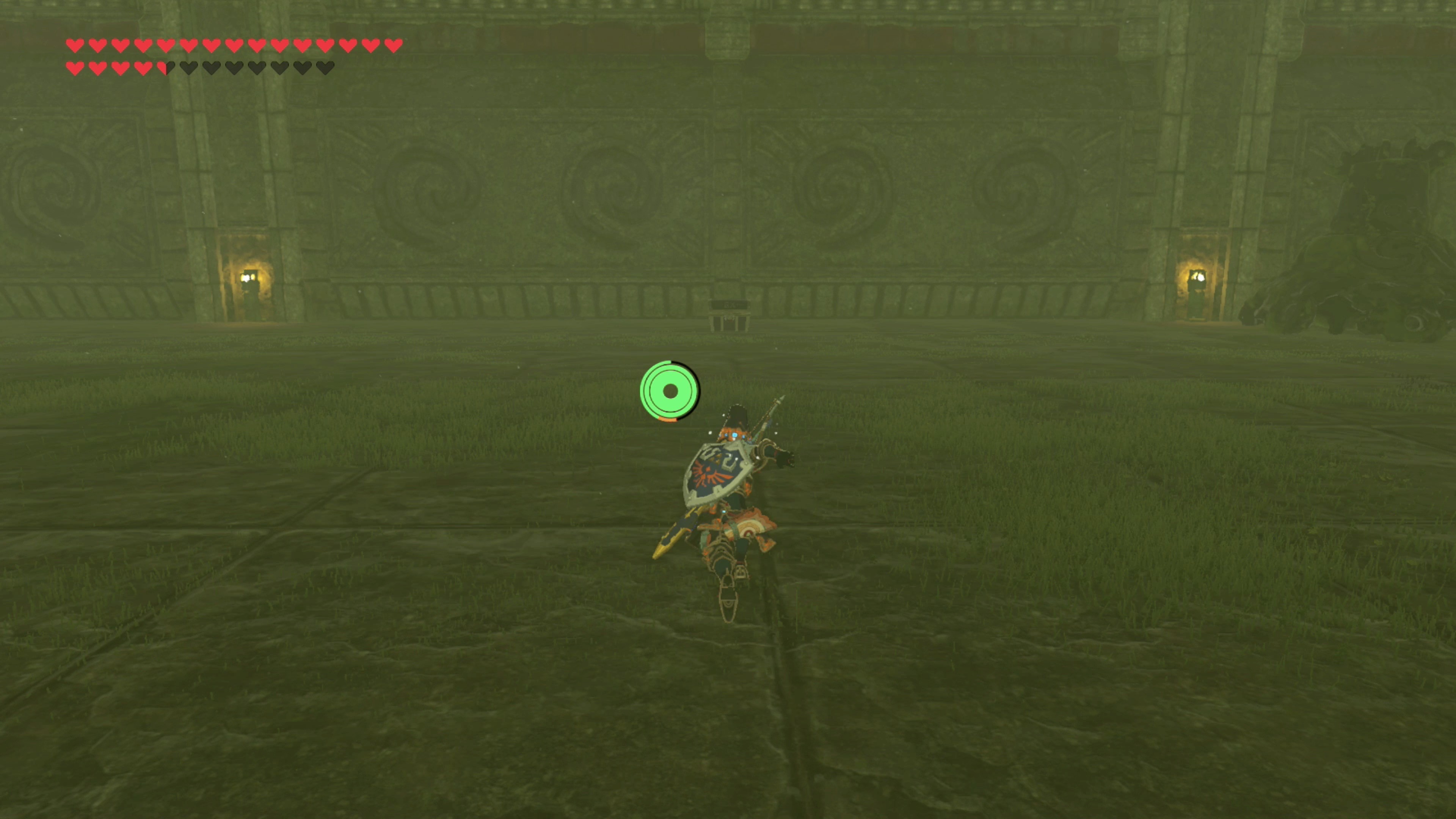 Link holding the Travel Medallion after opening the treasure chest.