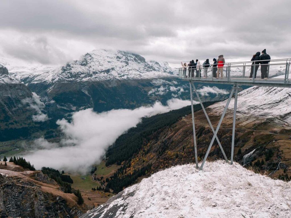 A picturesque view from the Matterhorn Glacier Paradise, showcasing a vast expanse of snow-capped peaks and highlighting the breathtaking alpine scenery of Switzerland